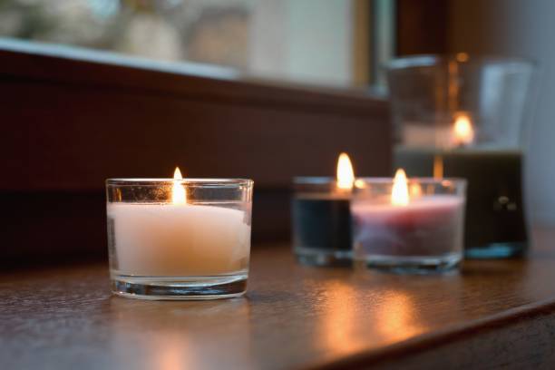 istock Lovely candles on the table, cozy home interior 2181708878