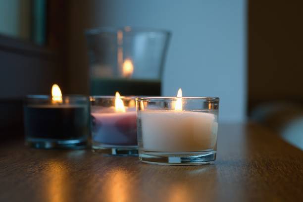 istock Lovely candles on the table, cozy home interior 2181708879