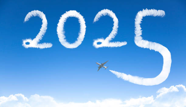 istock happy New year 2025 concept. cloud drawing by airplane in sky 2181710166