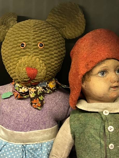 Vintage teddy bear and doll