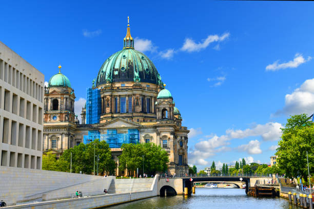 The photo from a pleasure boat shows Berlin Cathedral on Lustgarten on Museum Island is a Protestant church in Berlin's Mitte district.