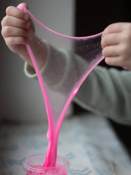 istock Child playing slime, hands close up 2181715623