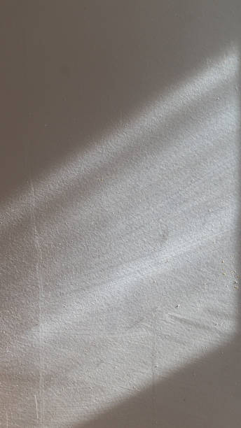 istock The white textured surface is illuminated from the stone by the sun at an angle 2181716726