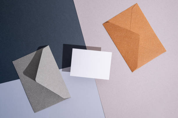istock Paper envelopes on a light background. New mail, write a message. Send and receive mail. Postal delivery service. Empty envelope, empty space. Communication with people, paperwork. Envelope close-up 2181717122