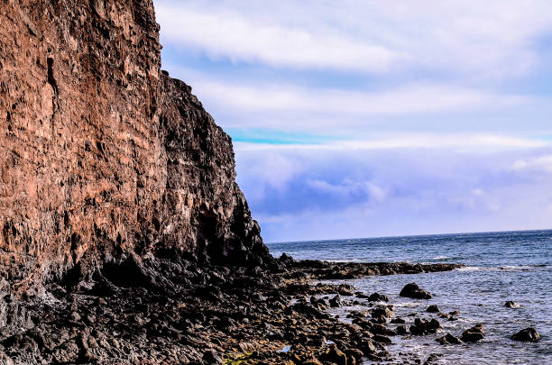 istock A rocky cliff overlooks the ocean 2181717486