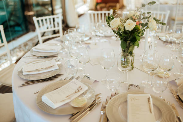 istock Table setting for an event party or wedding reception. Fresh flower table decoration 2181725747