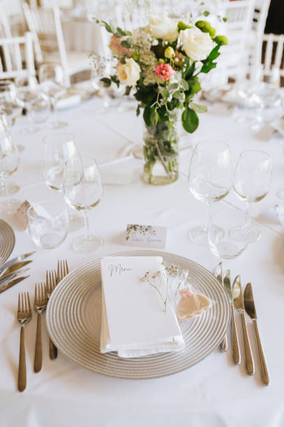 istock Table setting for an event party or wedding reception. Fresh flower table decoration 2181725750