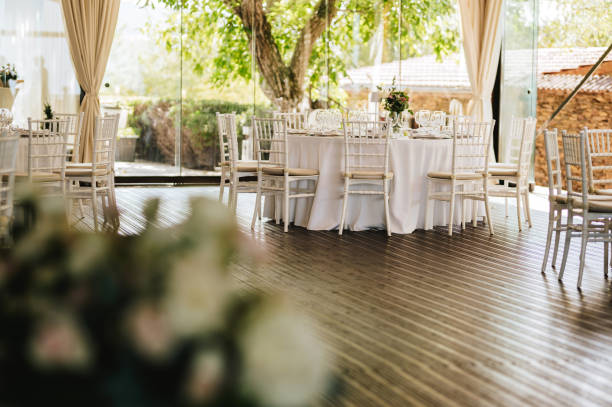 istock Table setting for an event party or wedding reception. Fresh flower table decoration 2181725759