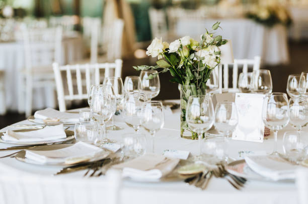 istock Table setting for an event party or wedding reception. Fresh flower table decoration 2181725760