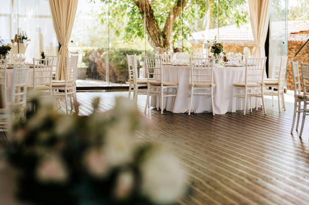 istock Table setting for an event party or wedding reception. Fresh flower table decoration 2181725764