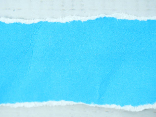 istock Blue paper with torn edges placed on a white background. 2181742587