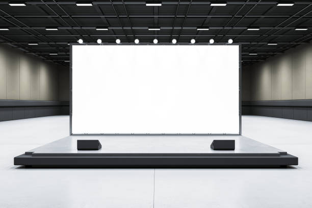 istock Blank illuminated press wall on stage in modern exhibition hall. 3D Rendering 2181746047