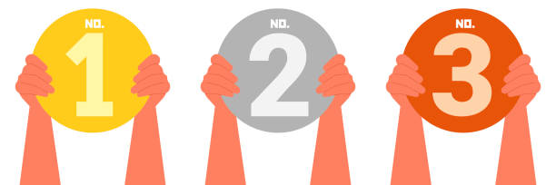 istock Hands holding gold, silver, and bronze medals labeled No. 1, No. 2, and No. 3, symbolizing badges of achievement in competition, represent success and ranking 2181748731