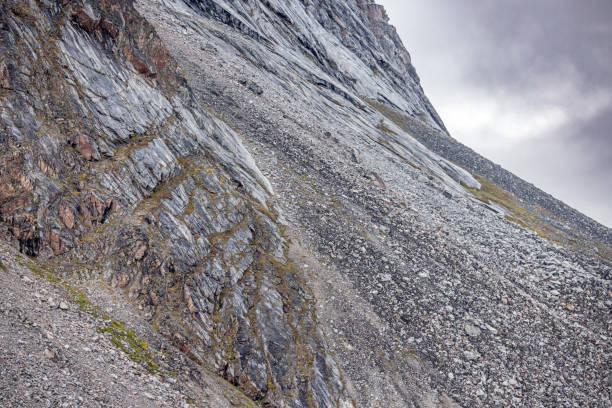 Barren sea cliff in a fjord outside Ilulissat in western Greenland which is an UNESCO World Heritage Site due to the famous Ice Fjord