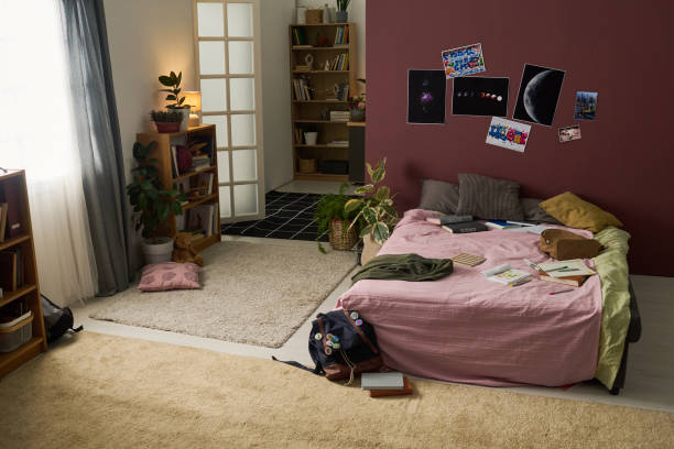 istock Cozy Bedroom Interior with Pink Bedding and Green Decor 2181750724