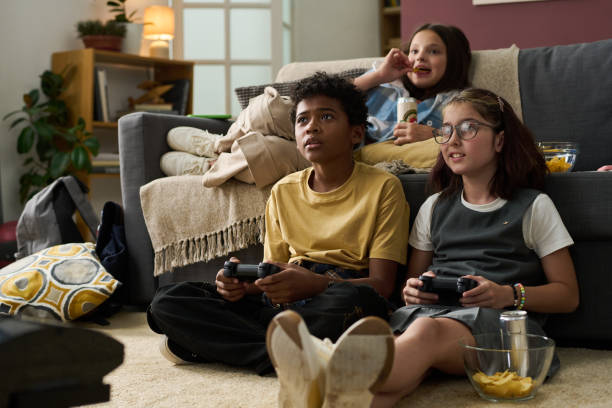 istock Playing Video Games at Home with Friends 2181750794