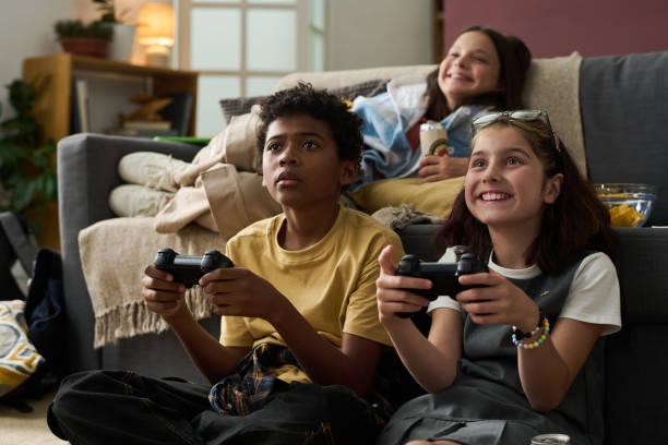 istock Enjoying Multiplayer Video Game Session at Home 2181750807