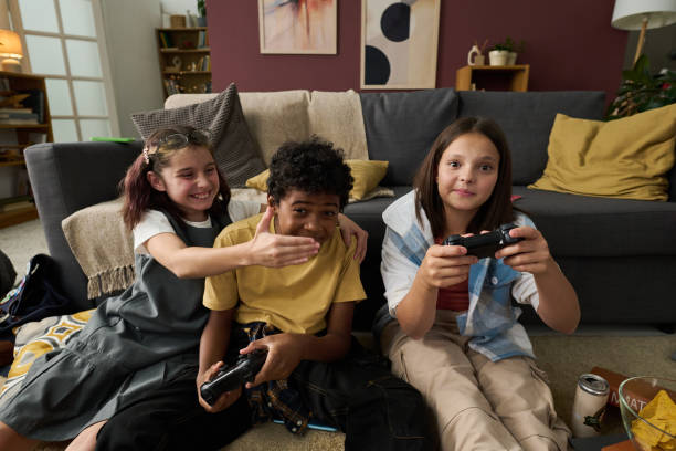 istock Playing Video Games in Cozy Living Room Setting 2181750812