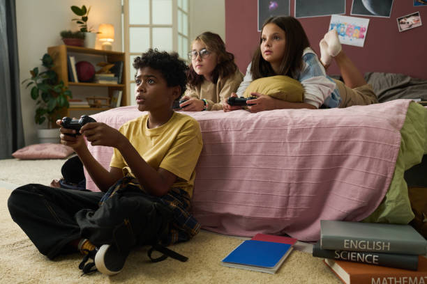 istock Engaging in Playing Video Games with Friends at Home 2181750826