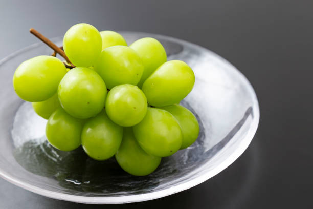 istock Shine Muscat on a black background 2181751098