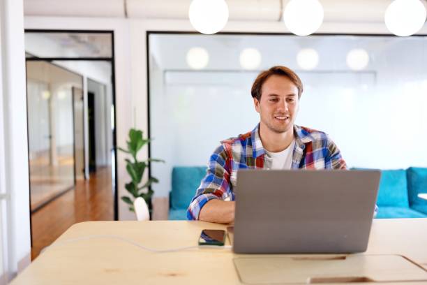 istock Portrait of a man working on his laptop 2181753986