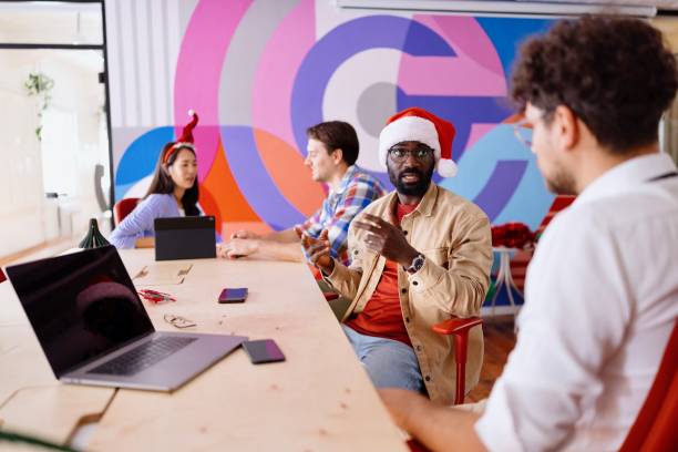 istock Colleagues talking about projects during the Holiday season 2181754274
