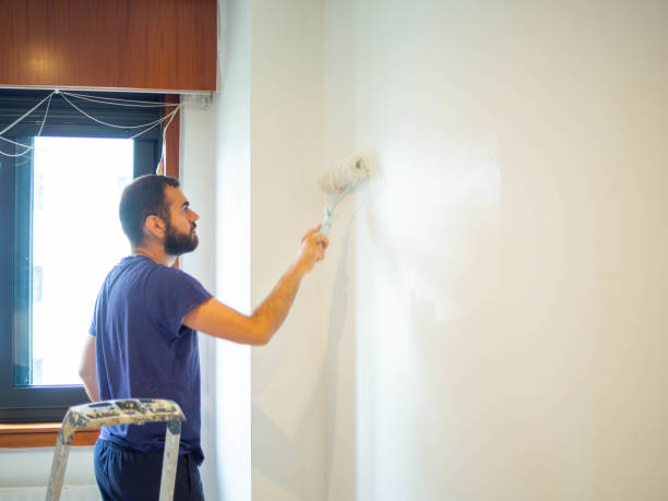 istock renovating and painting a house 2181759820