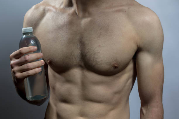 istock A young shirtless muscular man 2181759910