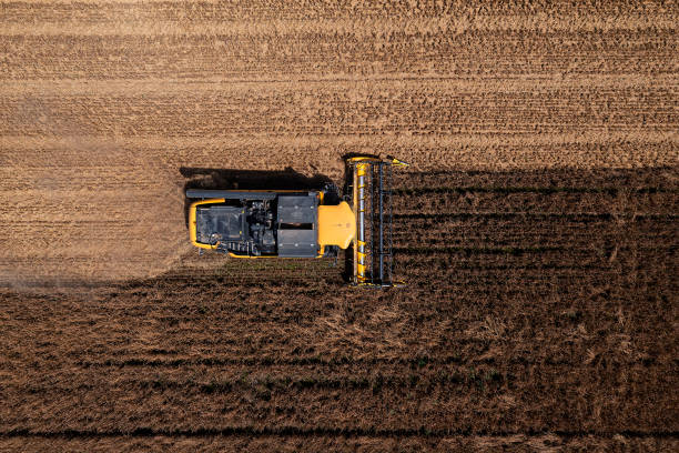 istock Combine harvester in field from above 2181761208