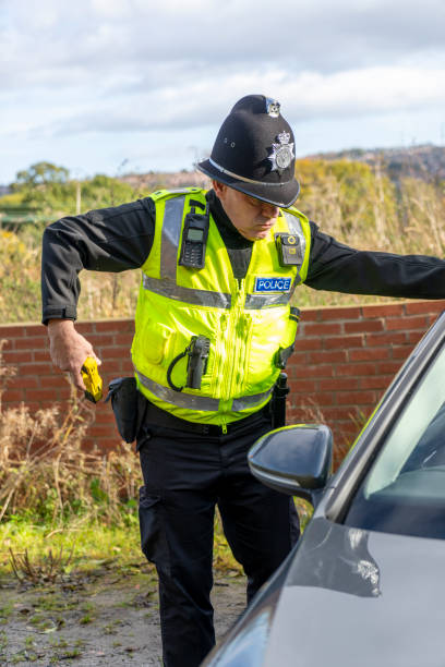 istock UK police officer holding a taser 2181763264