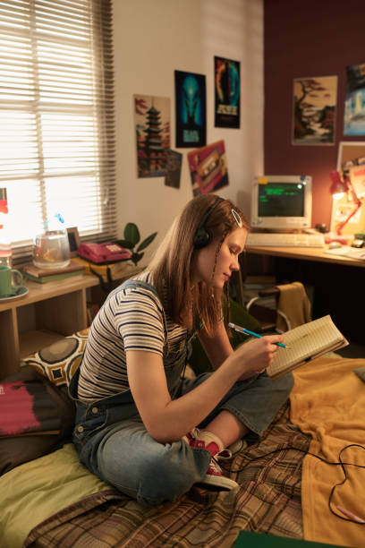 istock Studying in Cozy Bedroom with Computer and Headphones 2181766920