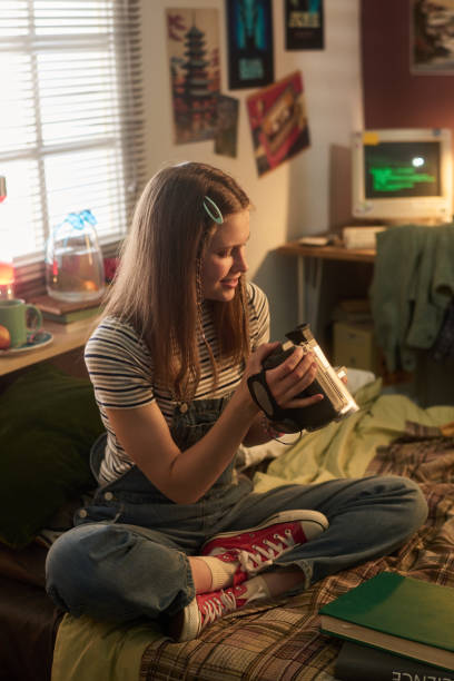 istock Enjoying Nostalgic Moments with Vintage Camera Indoors 2181766980