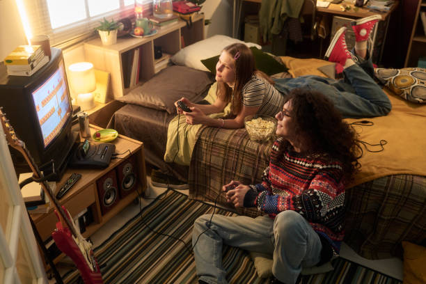 Enjoying Classic Video Game Together on Cozy Evening
