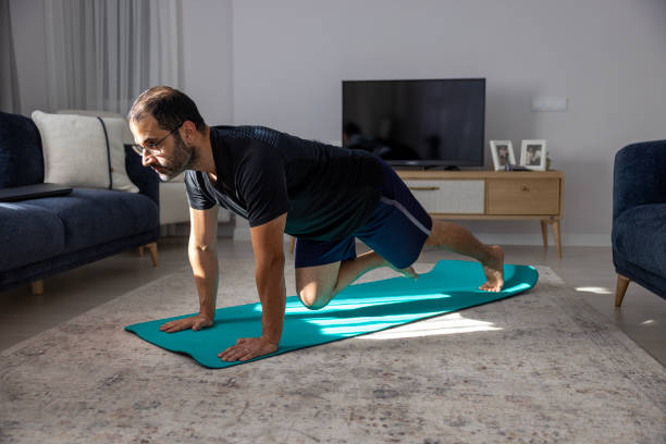 istock a man exercising at home 2181768226
