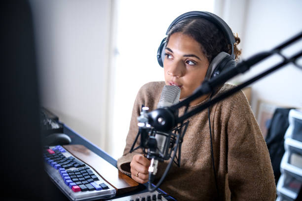 istock Woman recording a streaming podcast 2181768341