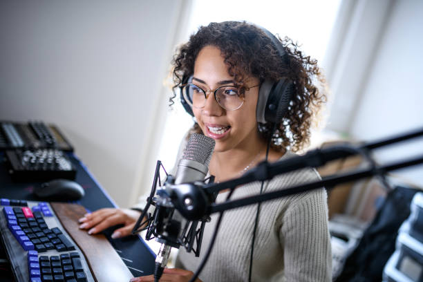istock Woman recording a streaming podcast 2181768404