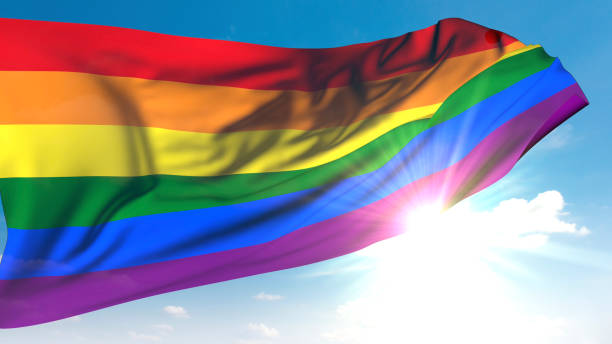 istock Lgbtqia Flag Waving in Sunny Sky 2181769184