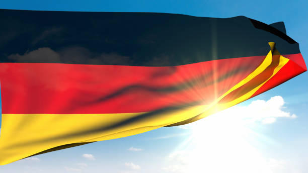 In the bright sunlight, the occasional wink of the sun behind the waving Germany flag gives hope. / You can see the animation movie of this image from my iStock video portfolio. Video number: 2181699396