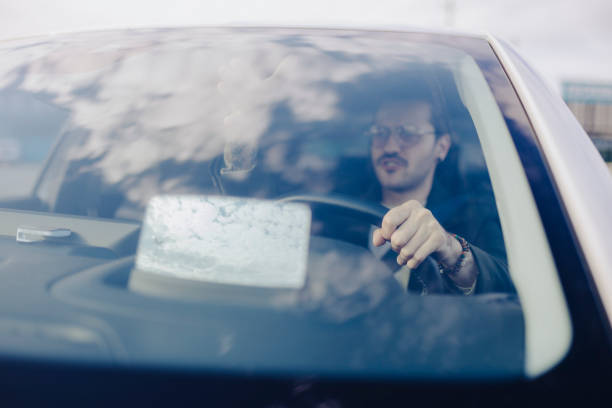 istock Happy man driving his car and smiling - transportation concepts 2181773257