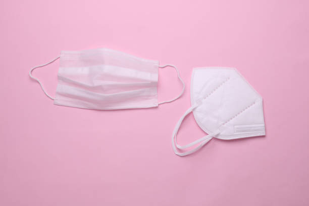 istock kn95 medical masks on a pink background 2181773445