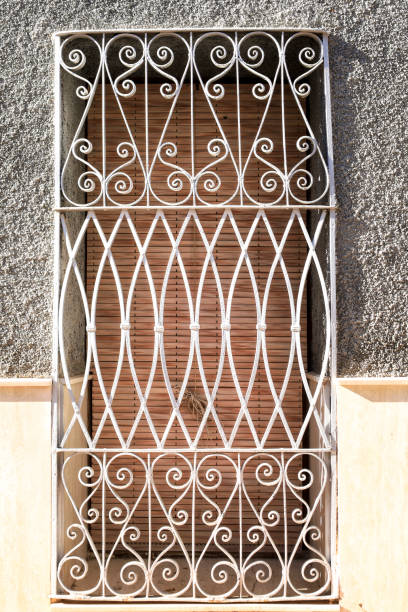 Window with wrought iron details in Chella town, Valencia