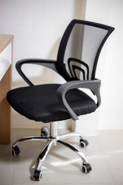 istock Computer chair with mesh back for cooling near the desk. Comfortable work at the computer 2181778387