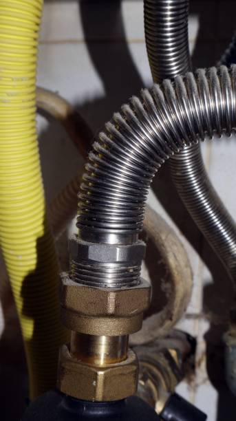 istock Insulated piping in the foreground Home heating system pipe 2181783808