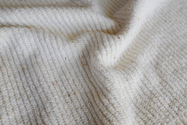 istock Cozy Thick Knit Cream Sweater Closeup With Texture 2181785562