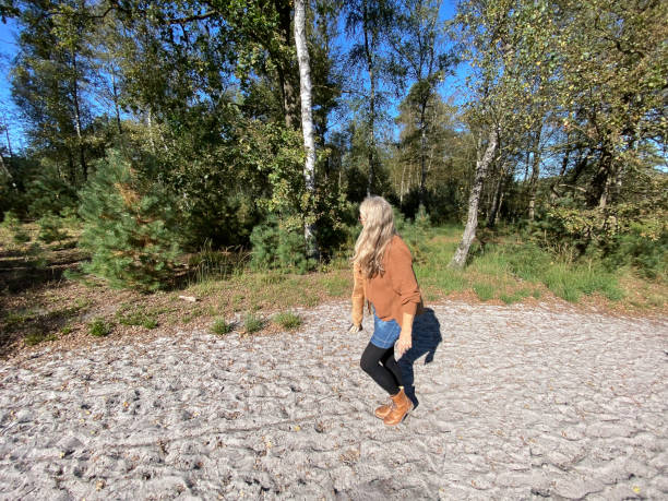 Woman walking in the Heath as part of a Healthy Lifestyle