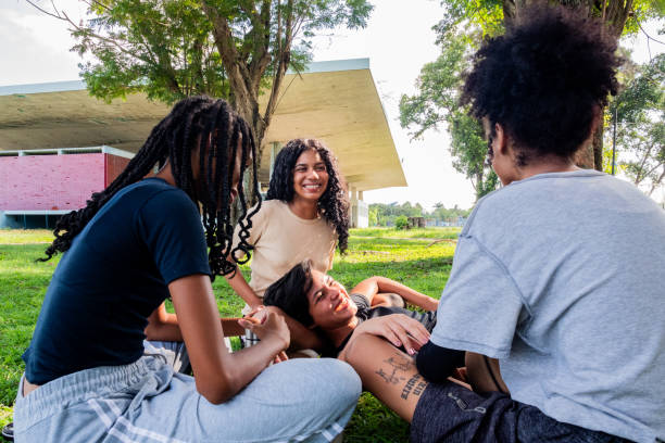 istock Young friends women talking on public park 2181794506