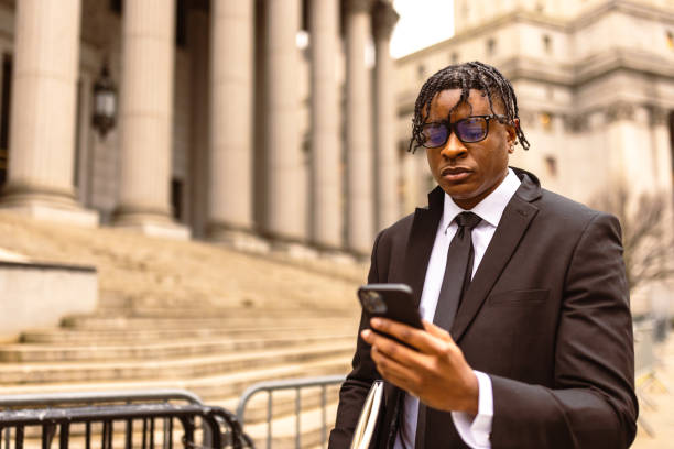 istock Business Professional Using Smartphone Outdoors 2181796783