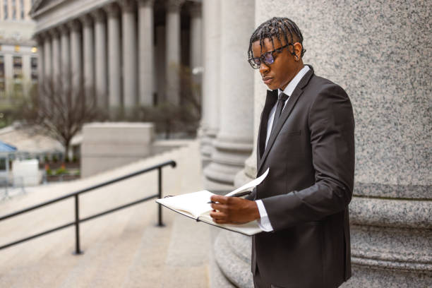 istock Businessman Standing with Tablet Outside Historic Building 2181796814