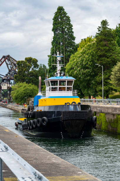 istock Tugboat Sailing through the Ballard Locks in Seattle 2181799511
