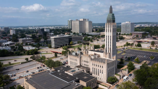 Downtown Tulsa Oklahoma Skyline Tulsa, Oklahoma, USA - June 25, 2023: Afternoon sun shines on historic buildings of downtown Tulsa. tulsa landmark stock pictures, royalty-free photos & images